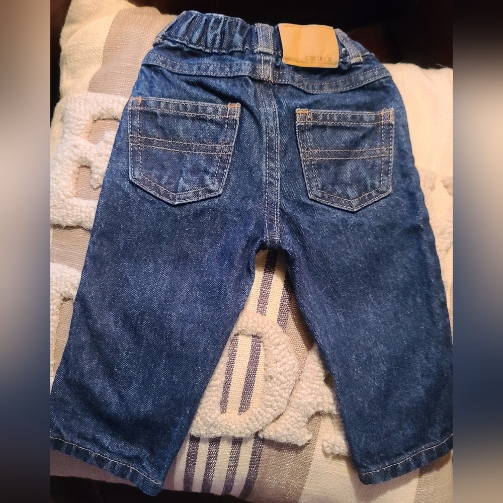 Like new CARTERS baby blue jeans 6 months  unisex fit Snap waist.